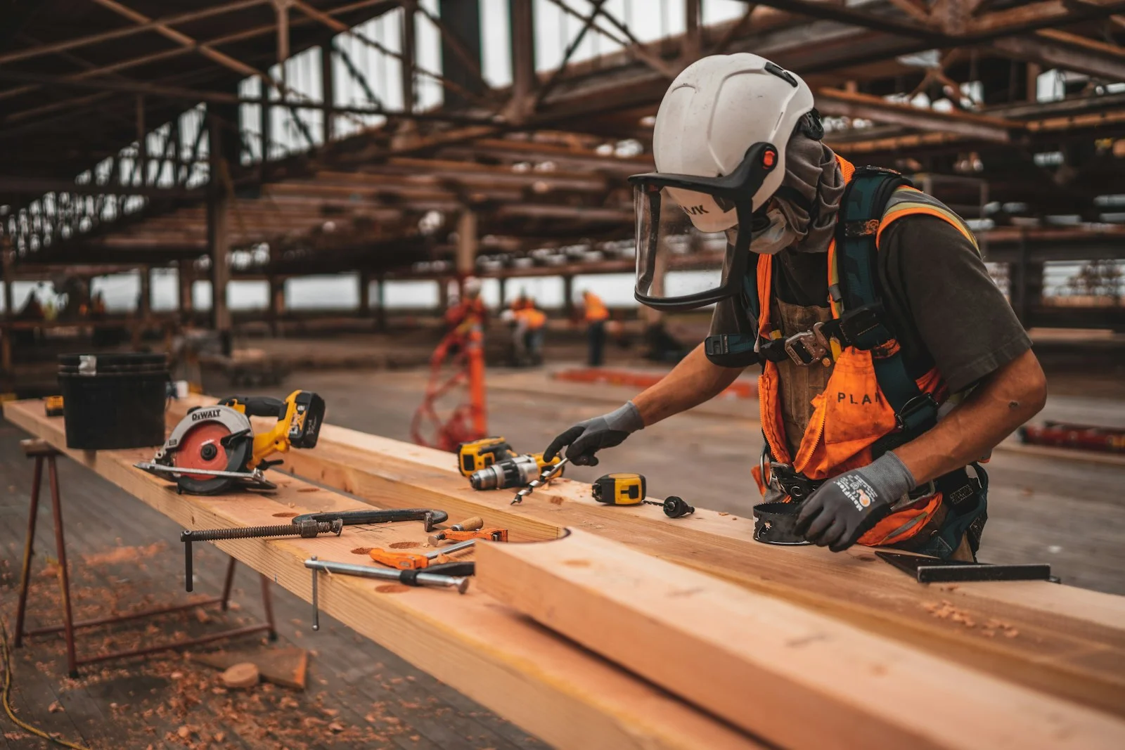 Site execution — materials, tools and measurement on an active build