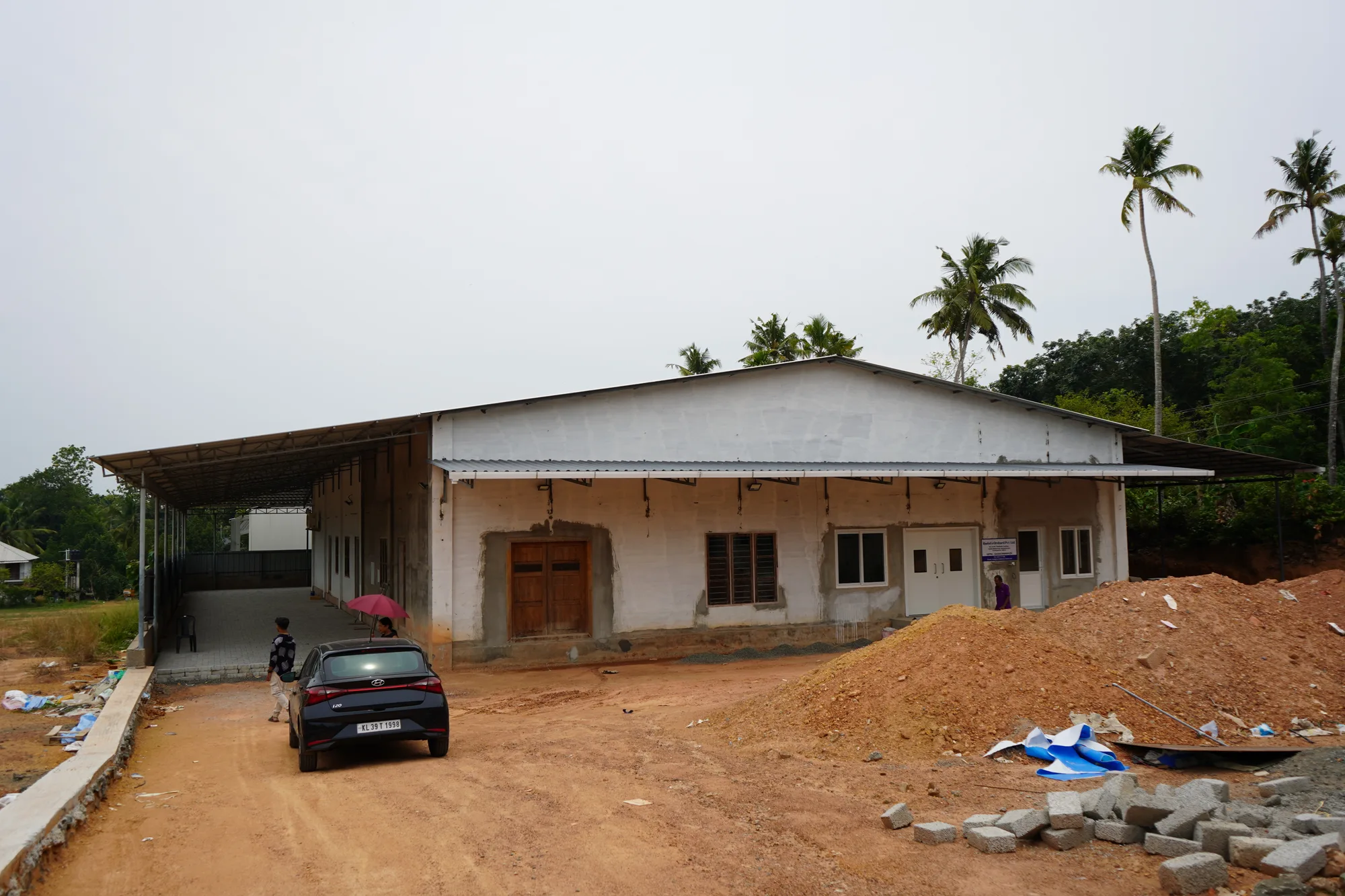 Factory building and site context at Mulanthuruthy