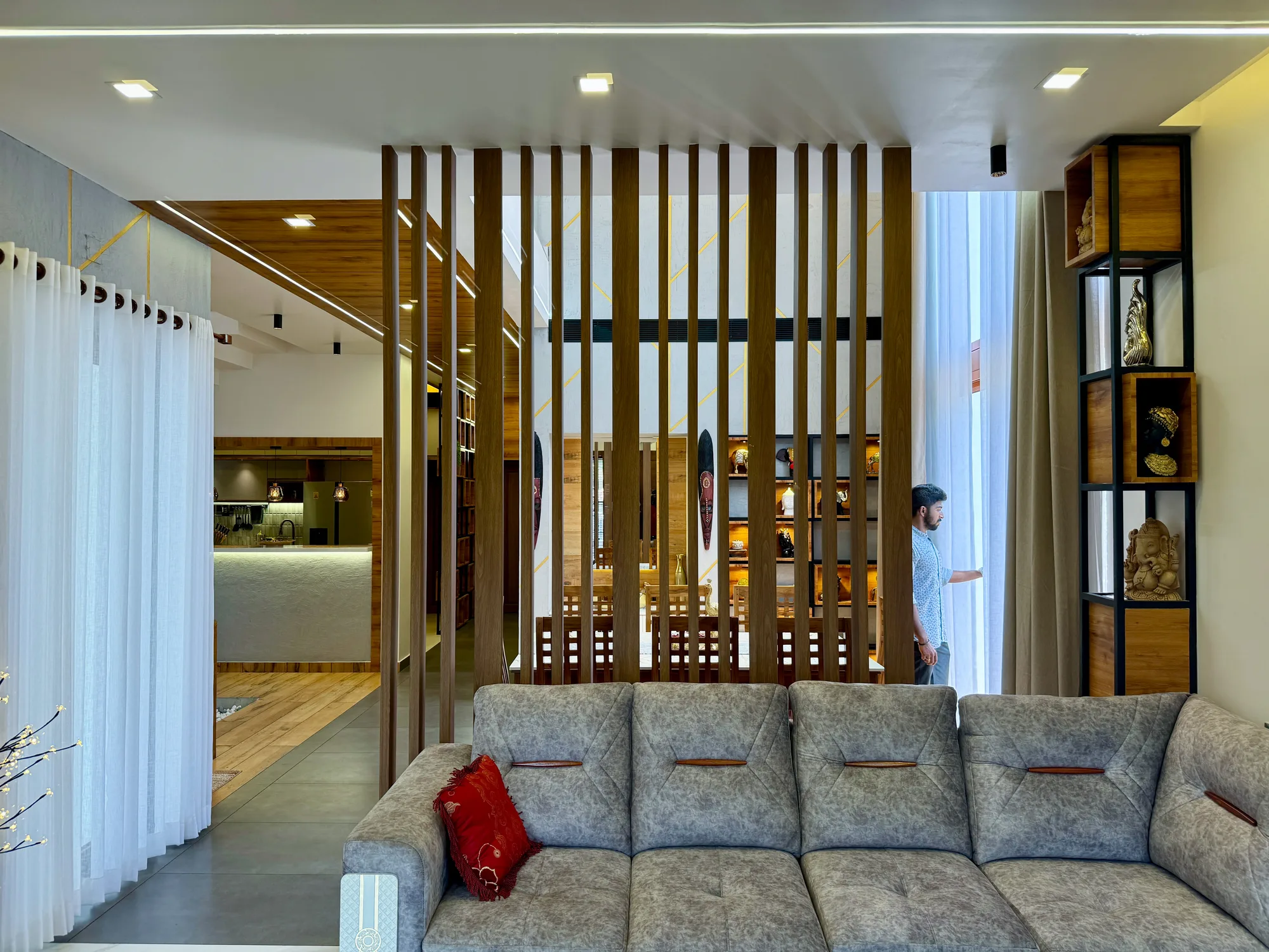 Family in the completed interior of Sanpra Pranavam