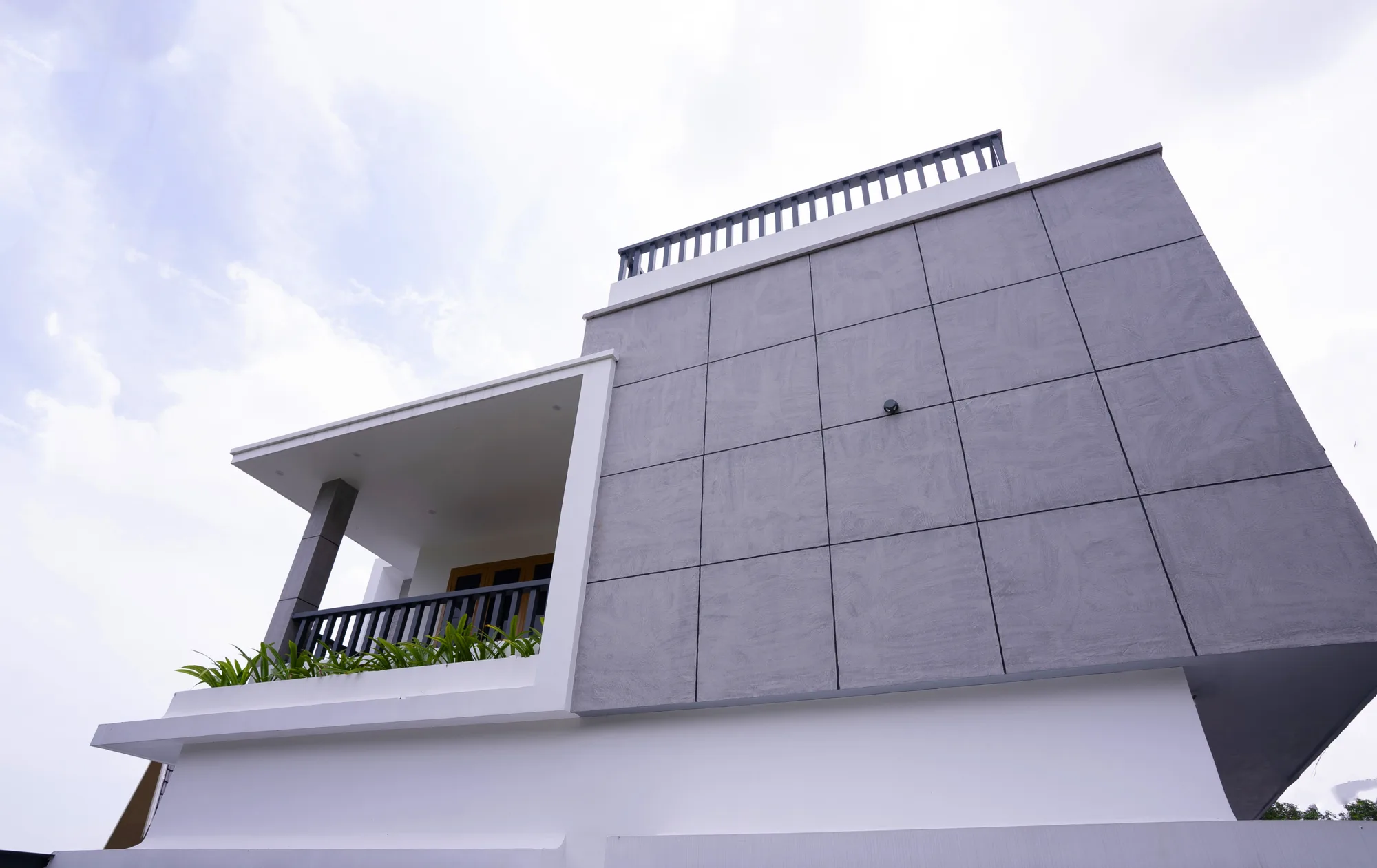 Semi-open outdoor space at Square One Residence